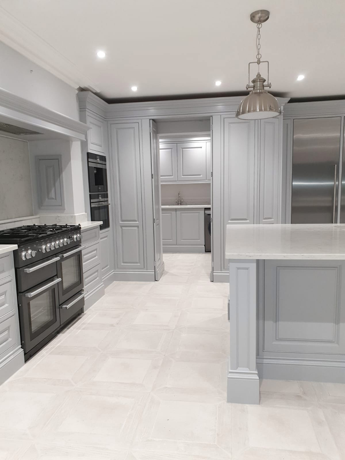 A secret hideaway to utility room in bespoke edwardian kitchen