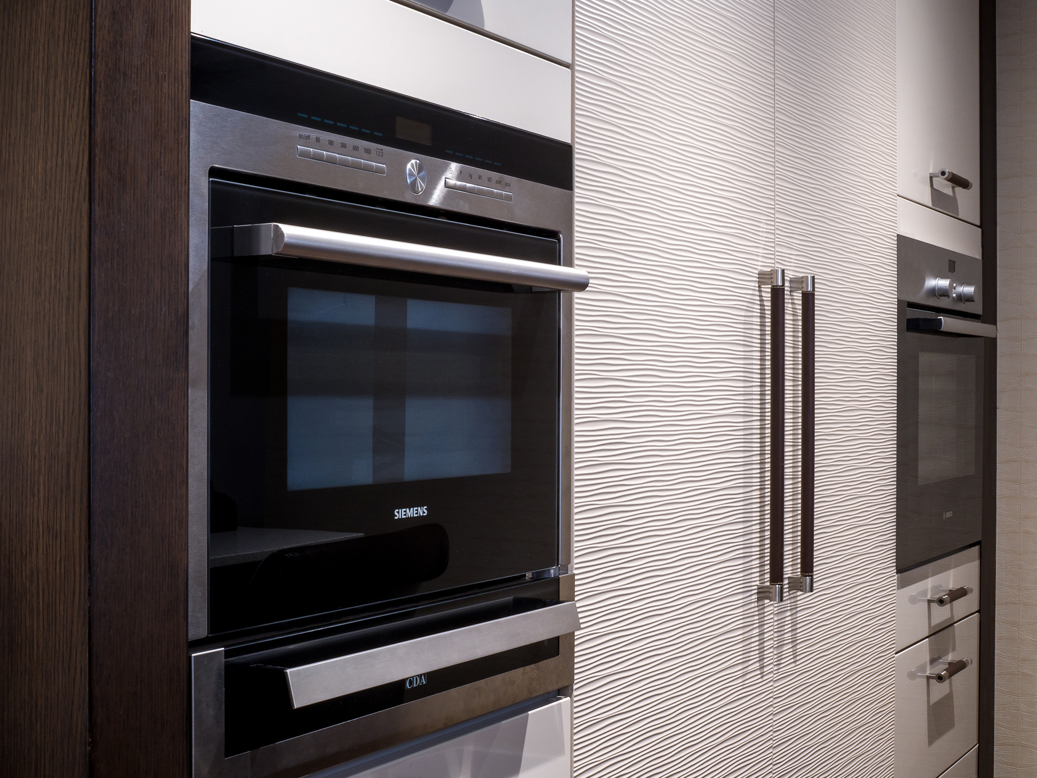 Modern Kitchen with textured doors
