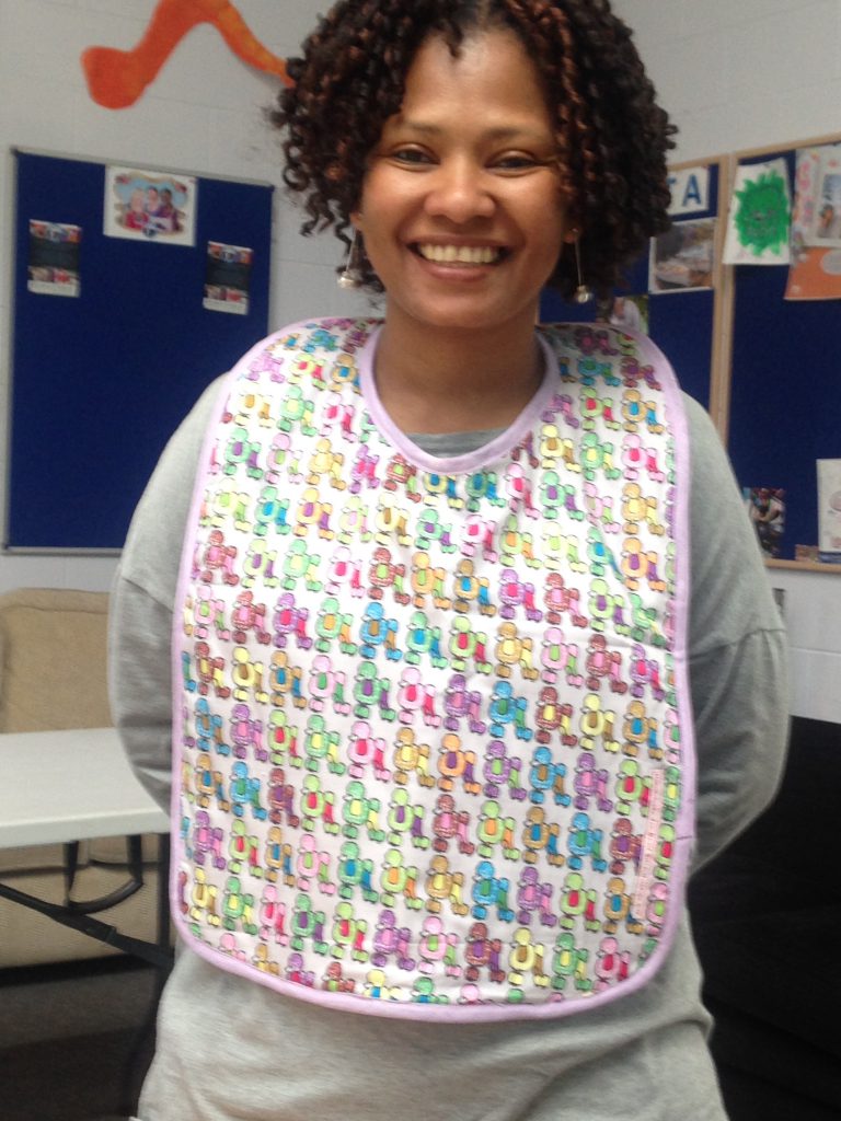 Faith Modelling Child's Poodle Pattern Every Day Bib