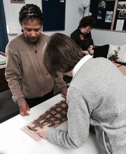 Isa and Faith busy cutting out their next masterpiece