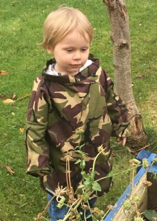 Our Rachel's gorgeous wee boy modelling our adventurer's smock