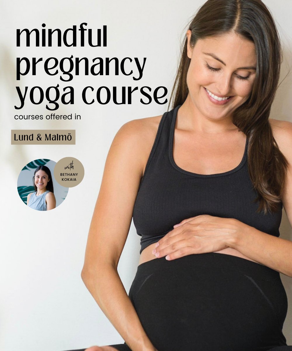 pregnant woman sitting in a prenatal yoga pose and holding her belly and smiling. the text on the photo says "mindful pregnancy yoga course with bethany kokaia"