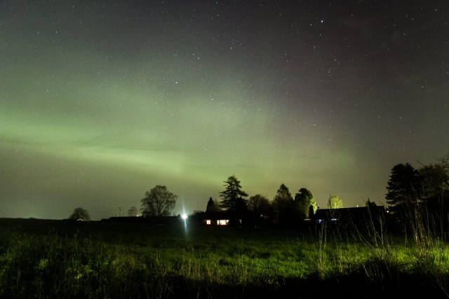 April 23 2023 between 22 :00 and 23:00, all of the North glowing, our house to the right (looking East), Græsted, Denmark.