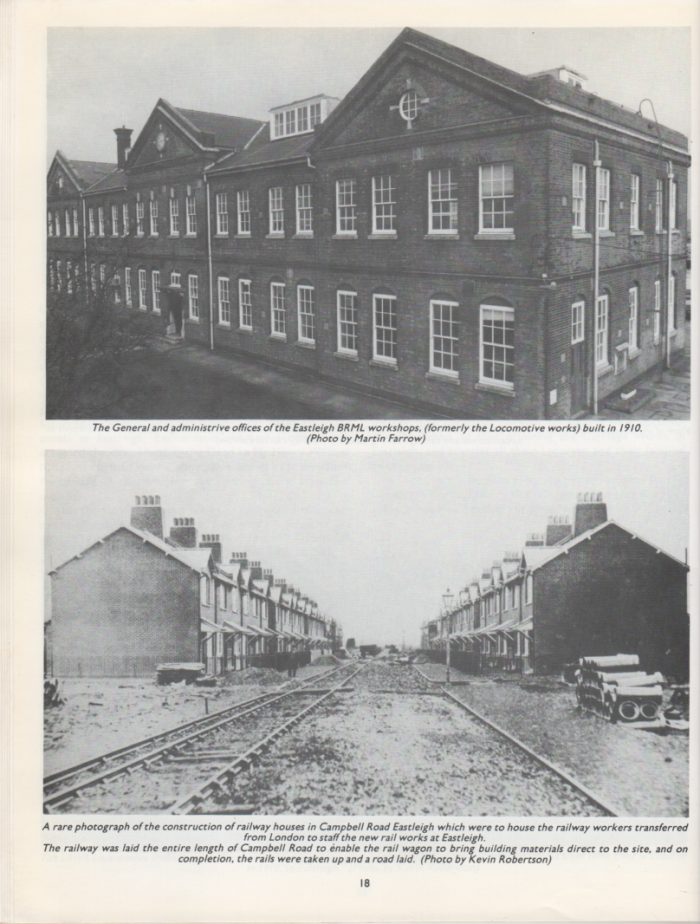 A black and white photo of a building with a train track Description automatically generated with low confidence