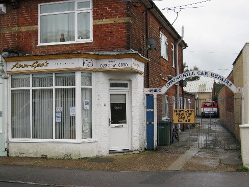 A building with a gate AI-generated content may be incorrect.