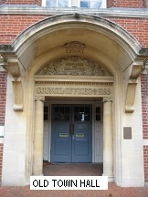 A building with blue doors Description automatically generated with low confidence