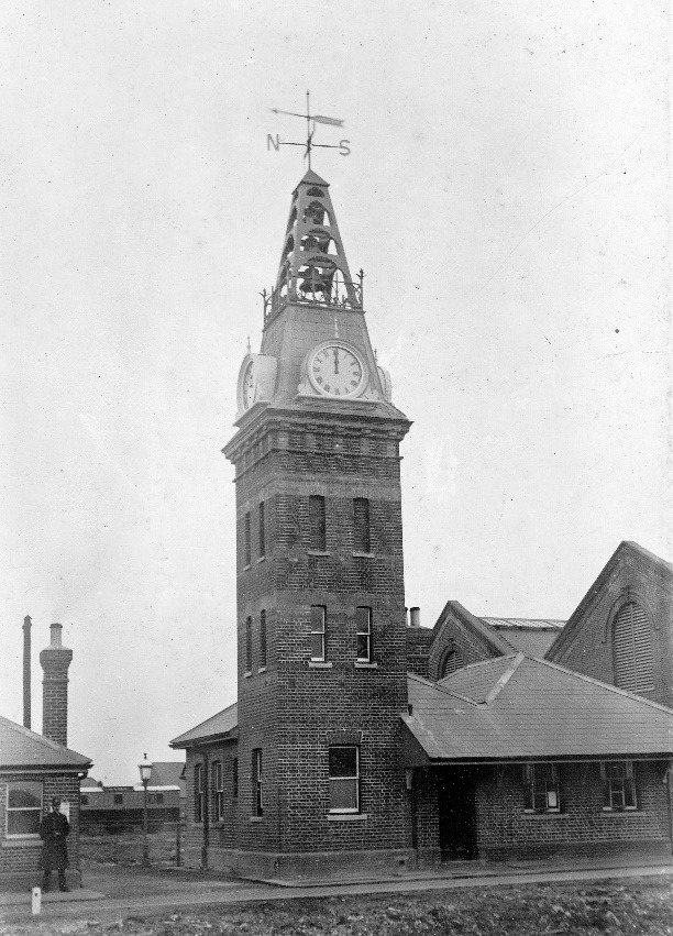 A clock tower on a building Description automatically generated with low confidence