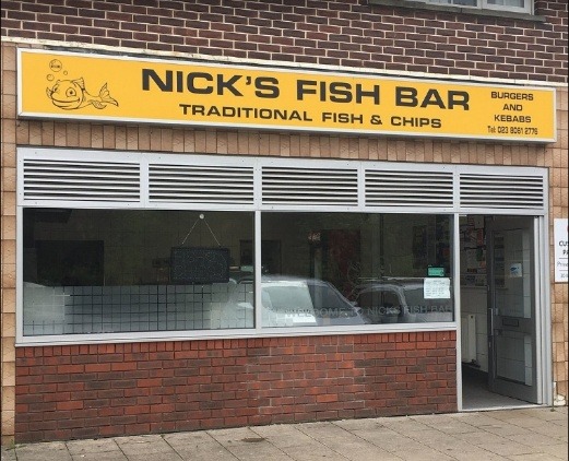 A fish bar with a sign AI-generated content may be incorrect.