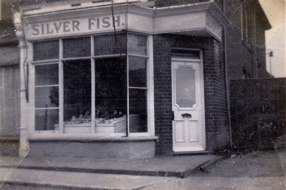 A fish store front with a fish display AI-generated content may be incorrect.