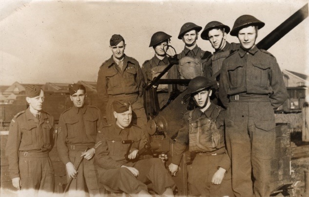 A group of men in military uniforms Description automatically generated with low confidence