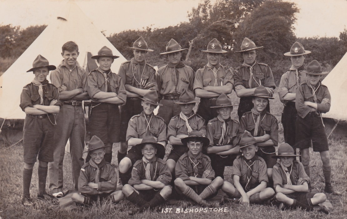 A group of men posing for a photo Description automatically generated with medium confidence