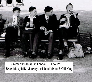 A group of people sitting on a bench Description automatically generated with medium confidence