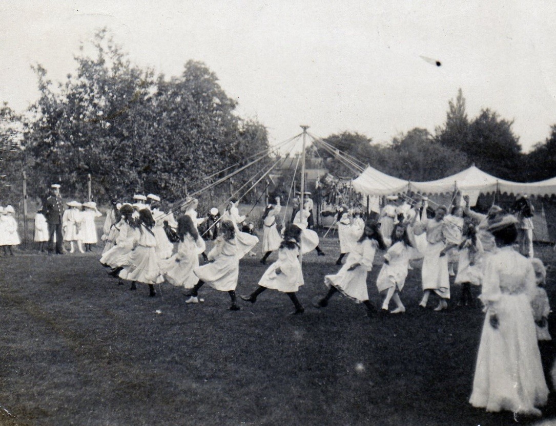 A group of women dancing Description automatically generated with medium confidence