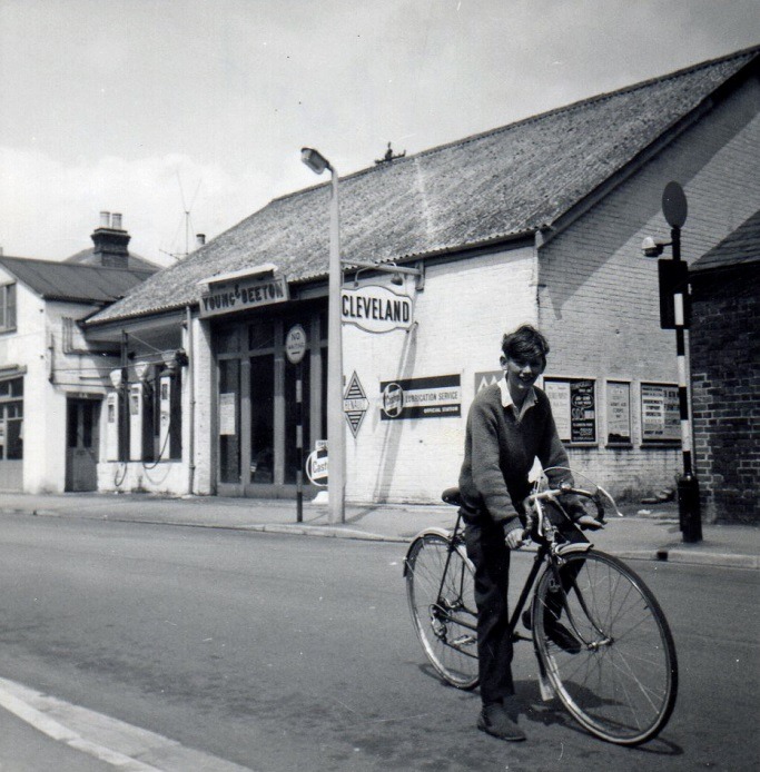 A person on a bicycle Description automatically generated with low confidence