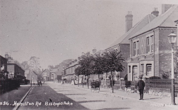 A picture containing text, outdoor, old, white Description automatically generated