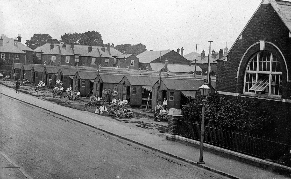 A road with houses along it Description automatically generated with low confidence