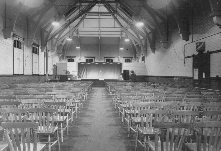 A room with many chairs AI-generated content may be incorrect.
