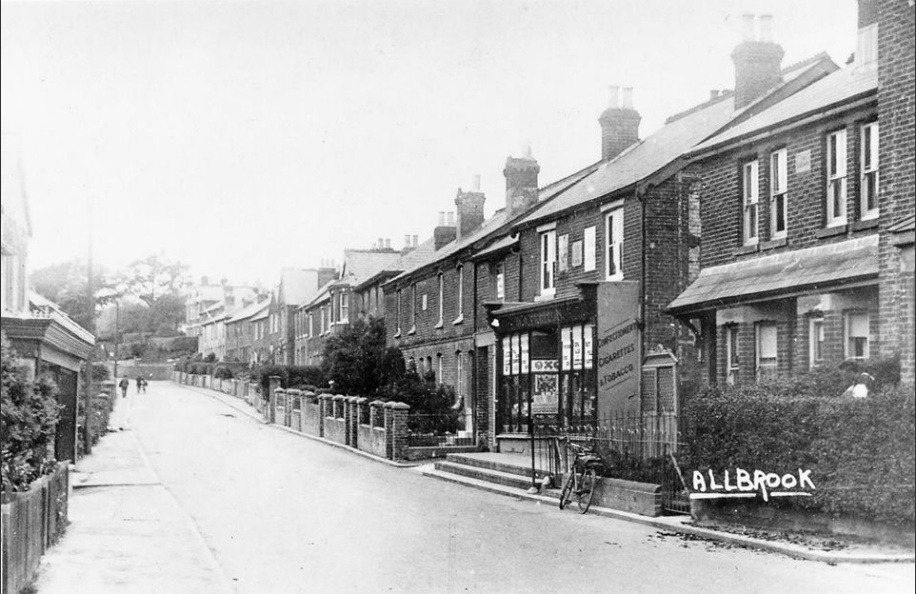 A row of houses on a street AI-generated content may be incorrect.