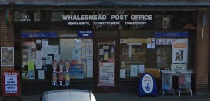 A store front with a sign AI-generated content may be incorrect.