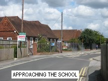 A street with buildings on the side Description automatically generated with low confidence