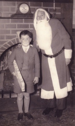 C:\Documents and Settings\Chris\My Documents\My Pictures\Humby Family Archive\Chris with Father Christmas present at Carriage Works Christmas Party.jpg