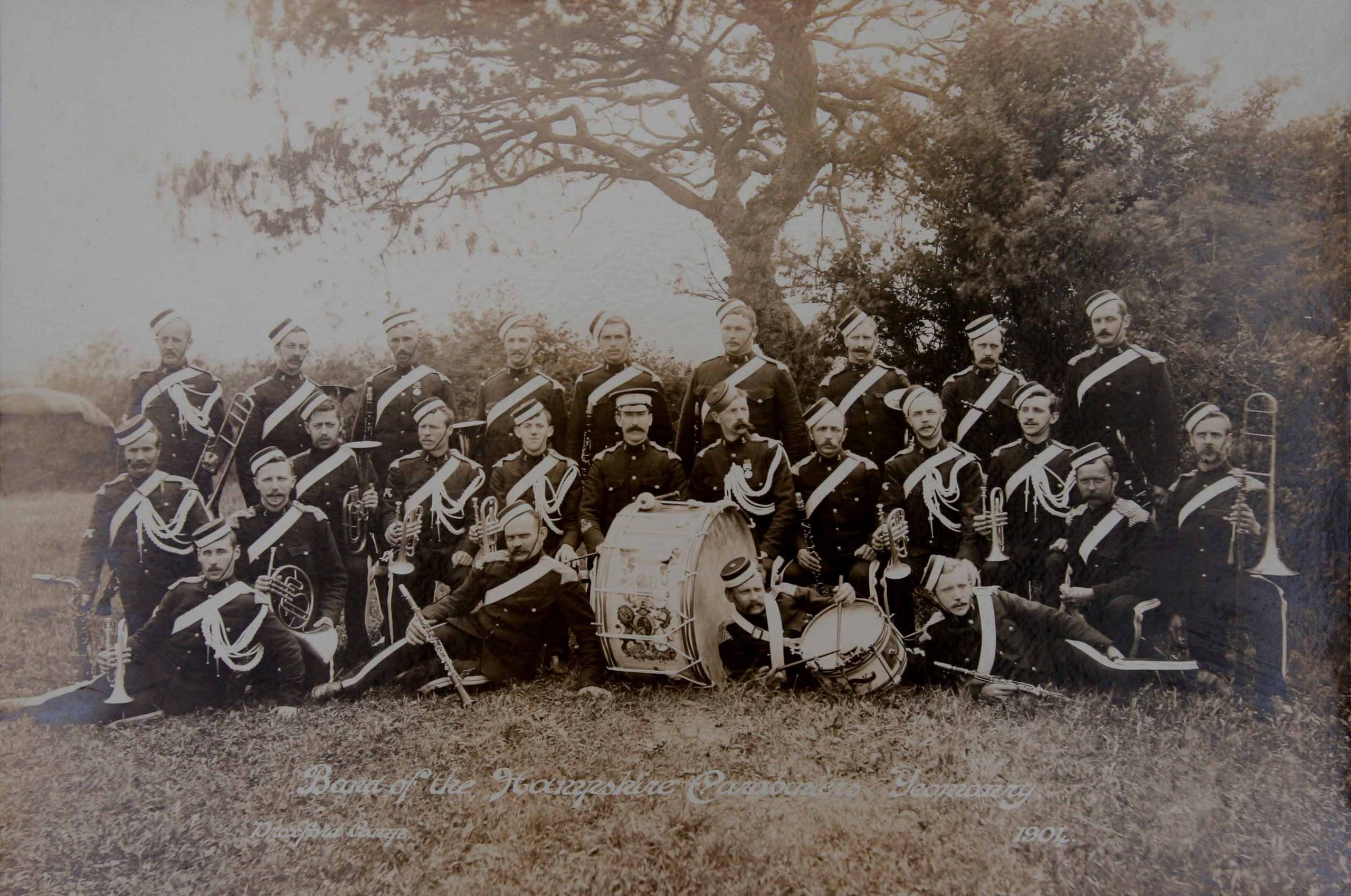 C:\Documents and Settings\chris\My Documents\My Pictures\Old Bishopstoke Pictures\Band of the Hampshire Carabiniers Yeomanry, Droxford Camp 1904. F.C. Humby to left of drum with clarinet b.jpg