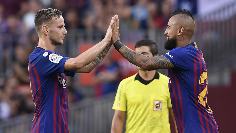 Ivan Rakitic and Arturo Vidal // AFP