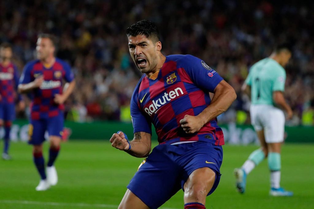 Luis Suárez celebrating a goal against Inter Milan. / GETTY IMAGES