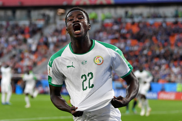 Moussa Wagué celebrating a goal for his national team, Senegal / DAN MULLAN/GETTY IMAGES EUROPE