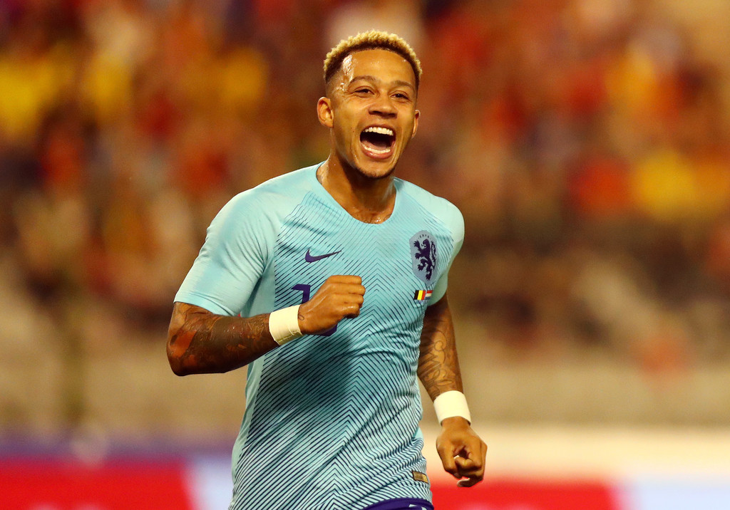 Memphis Depay, celebrates during an international friendly for his native Netherlands / DEAN MOUHTAROPOULOS/GETTY IMAGES EUROPE