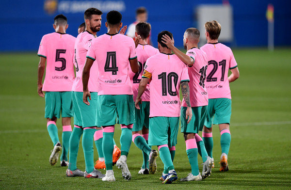 FC Barcelona players celebrating a goal during the pre-season friendly against Girona on September 16, 2020 / DAVID RAMOS / GETTY IMAGES EUROPE