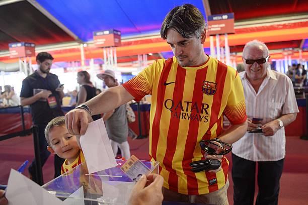 FC Barcelona's supporter casts his ballot during the FC Barcelona's president elections at the Camp Nou stadium in Barcelona on July 18, 2015. AFP PHOTO/JOSEP LAGO (Photo credit should read JOSEP LAGO/AFP via Getty Images)