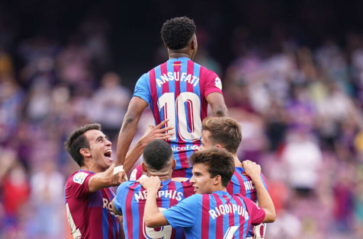 Ansu Fati getting lifted up into the air after scoring on his return from injury / PEDRO SALADO / QUALITY SPORT IMAGES