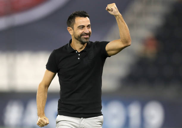 Xavi Hernandez celebrates Al Sadd's goal against Al-Duhail during the AFC Champions League Round of 16 second leg on August 13, 2019 / KARIM JAAFAR/AFP