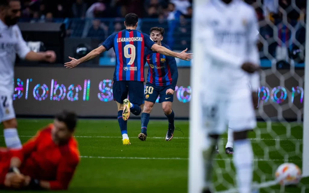 Gavi and Lewandowski celebrating a goal against Real Madrid/ FC BARCELONA