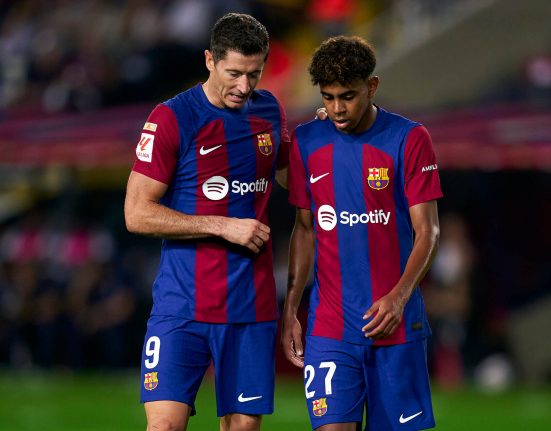 Robert Lewandowski with Lamine Yamal / Getty Images