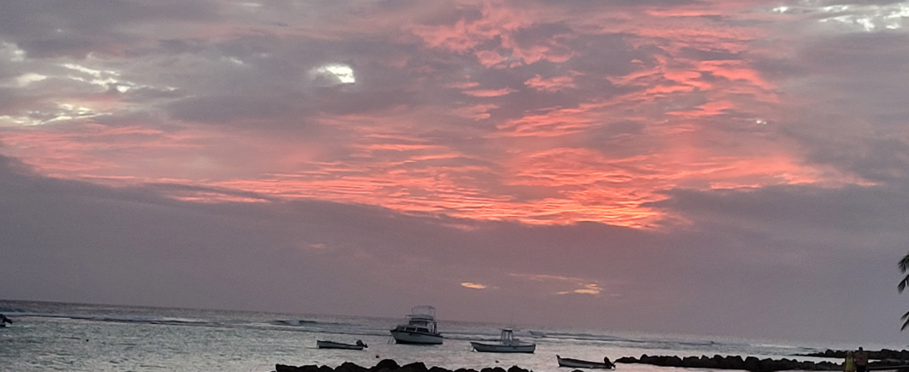 Picture of a clouded sunset on a beach in Barbados