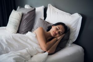 Good dreams make your day better. Attractive young woman sleeping joyfully