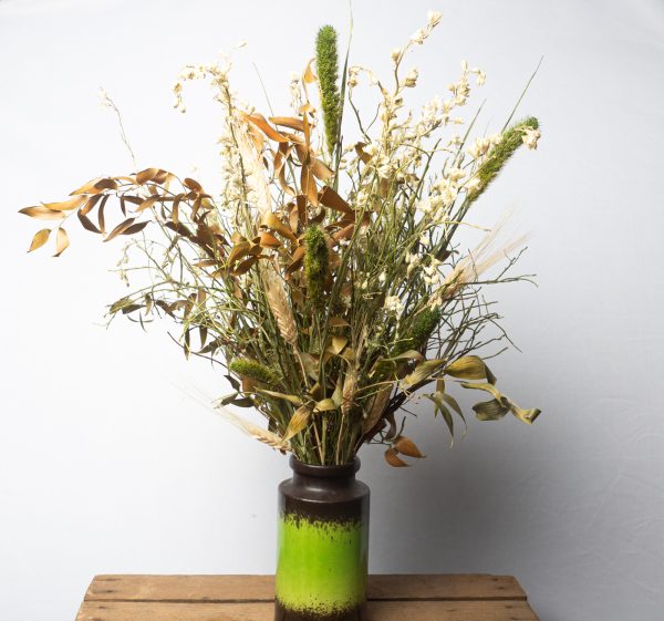 grøn evighedsbuket i vase