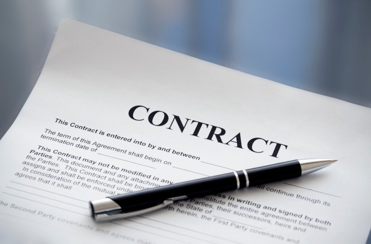 Close up of a contract and black pen