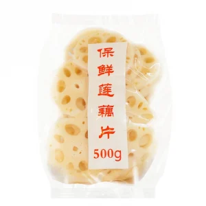 En bild på Lotusrot, i vit och hålliga natur, en krispig och unik ätbar rot, populär i asiatisk matlagning.