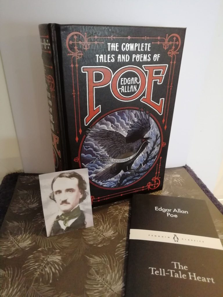: You can see the two books I have of Edgar Allan Poe and a small picture of himself.