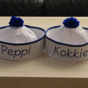 Peppi en Kokkie op aangeleverde mutsjes geborduurd