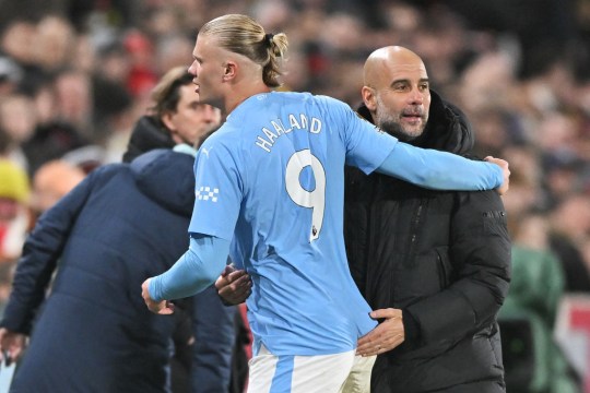 Erling Haaland embraces Pep Guardiola during Manchester City clash