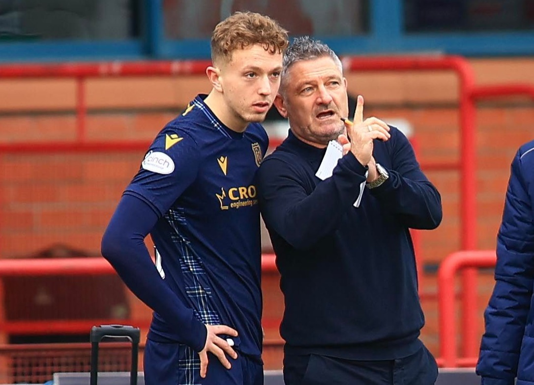 Dundee boss Tony Docherty slammed the challenge on Mellon, pictured with him yesterday