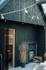 The sauna is heated with a woodburning stove that’s accessible from the deck outside.