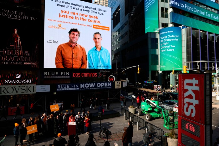 A billboard in Times Square lets New Yorkers know about the new law