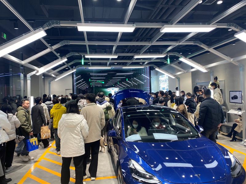 Tesla owners in China protest against surprise price cuts they missed