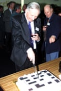 Araucaria cuts his 80th birthday cake.