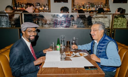 Don and Atam sitting at a restaurant table